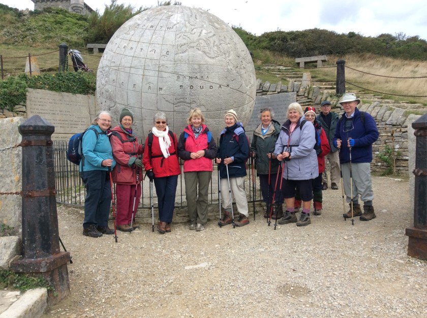 Group posing in front of the Globe at the Dunston Country Park