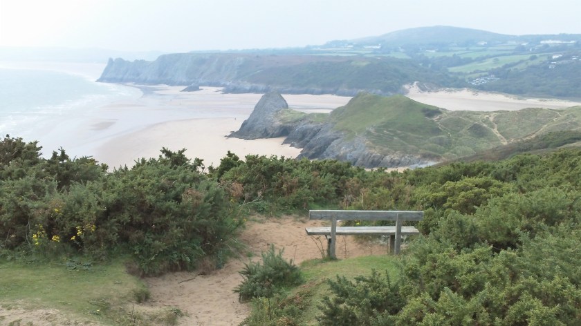 Spectacular view back across Three Cliffs beach and headland