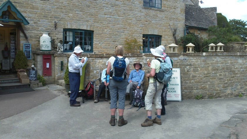 Group having a drinks beaks during early part of the walk