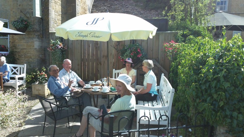 Group enjoying a well earned cream tea at the end of the walk