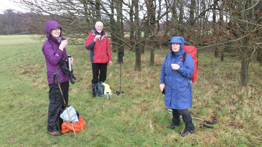 Coffee break in the rain early in the walk .