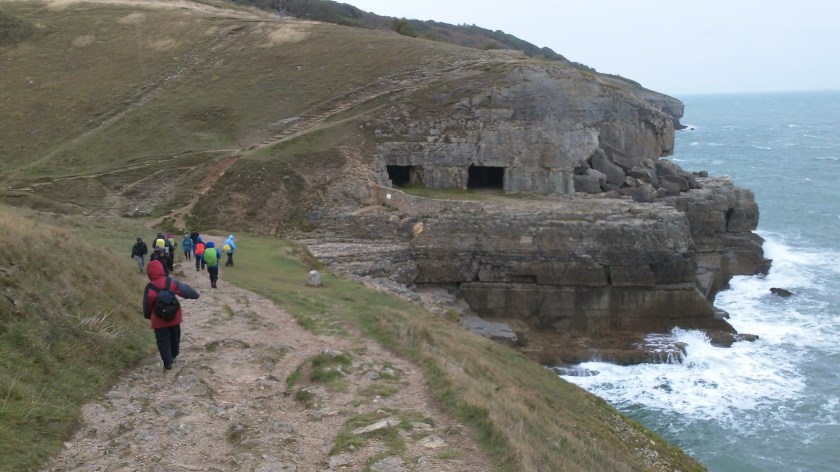 Group approaching the Tilly Whim Caves on the way east towards Swanage on the SWCP