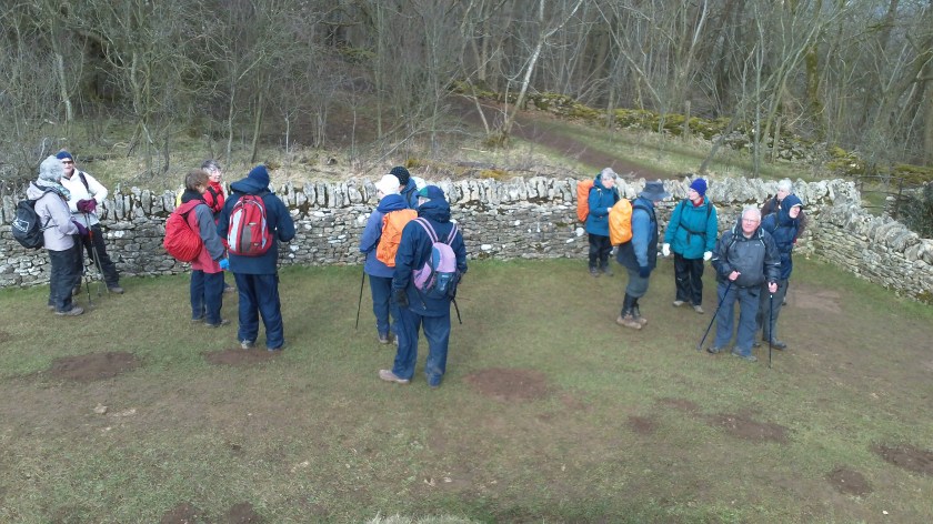 Group leaving the Belas Knap burial chamber towards end of walk -having checked all are still present!!