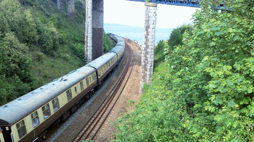 Train coming into Teignmouth from Dawlish along the line destroyed by storms last winter.