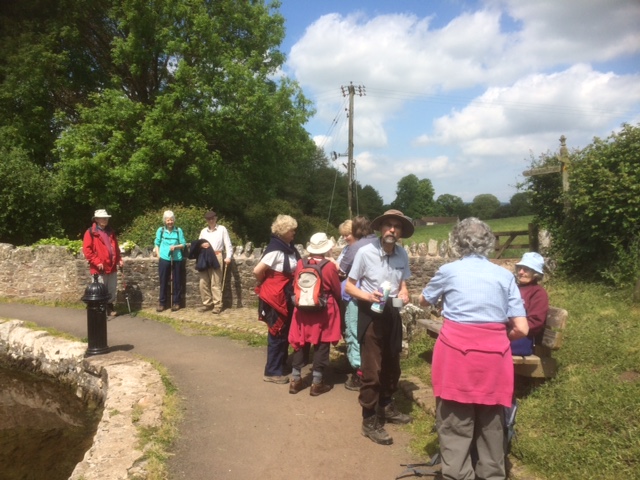 Group taking a break in the lovely village of Rickford during the walk.