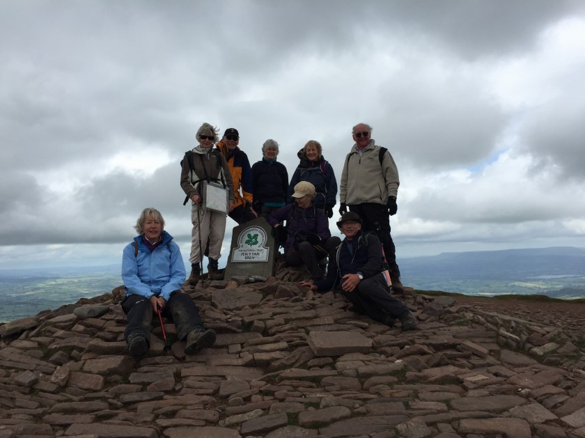 Group make it to the top of Pen y Fan -don't they look pleased with themselves!