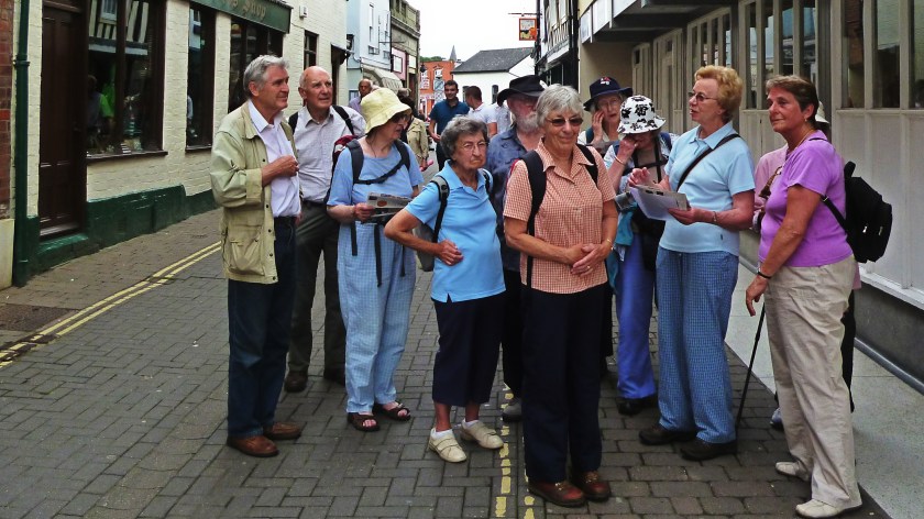 Group receiving another briefing from Davina in Ludlow