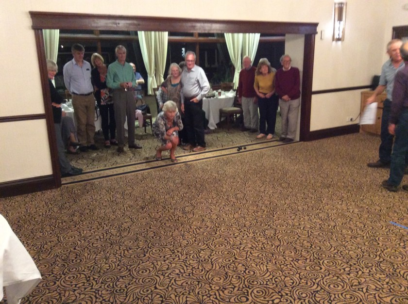Wendy gets in practise at carpet bowls -notice the intense concentration!