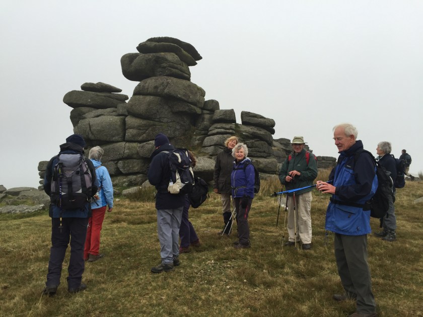 Group taking a break in front of "another" tor early in the walk!